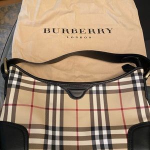 Authentic Burberry like new.  Used only once.
